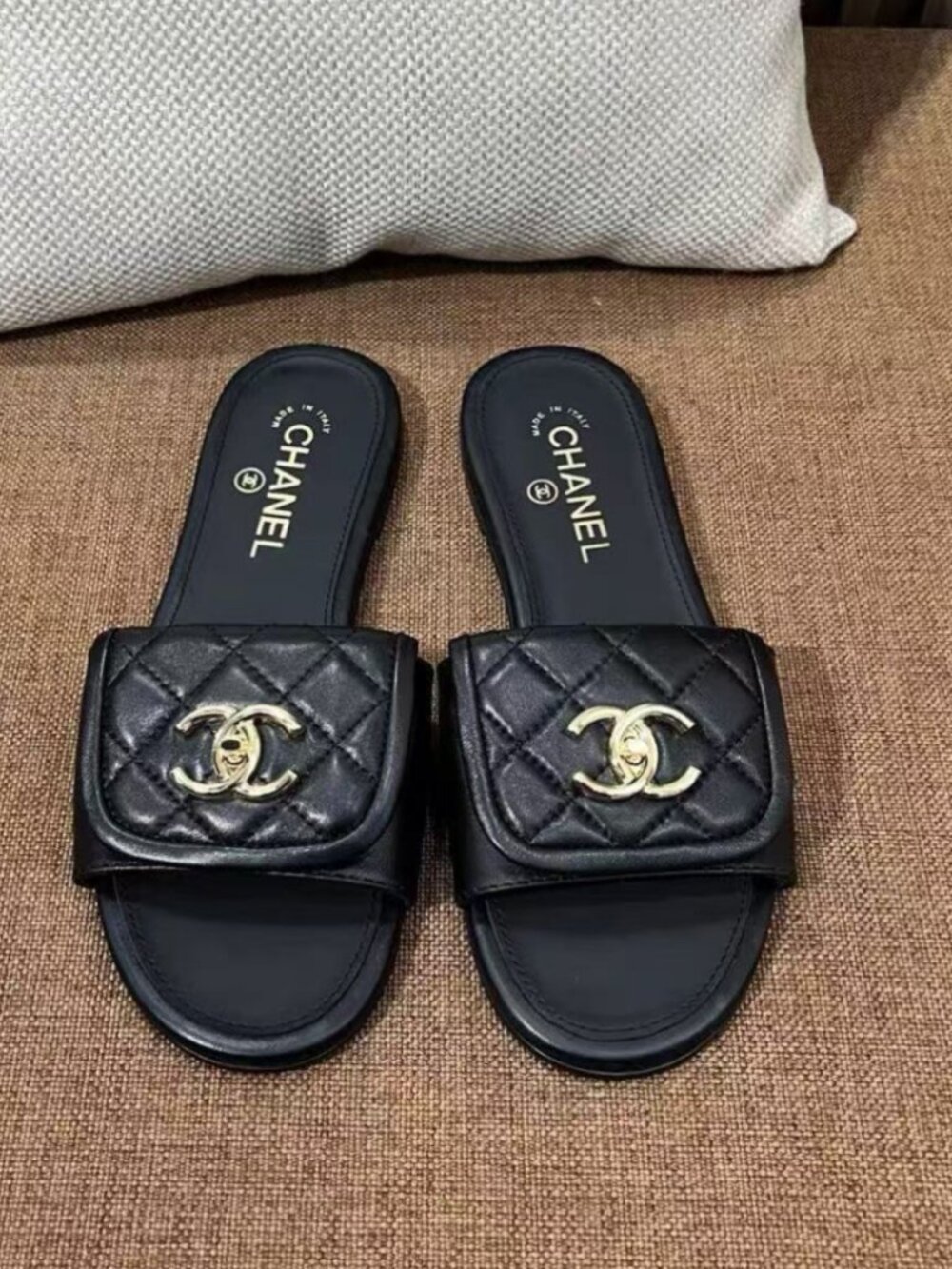 CHANEL Black Quilted Lambskin CC Turn‑Lock Slide Sandals